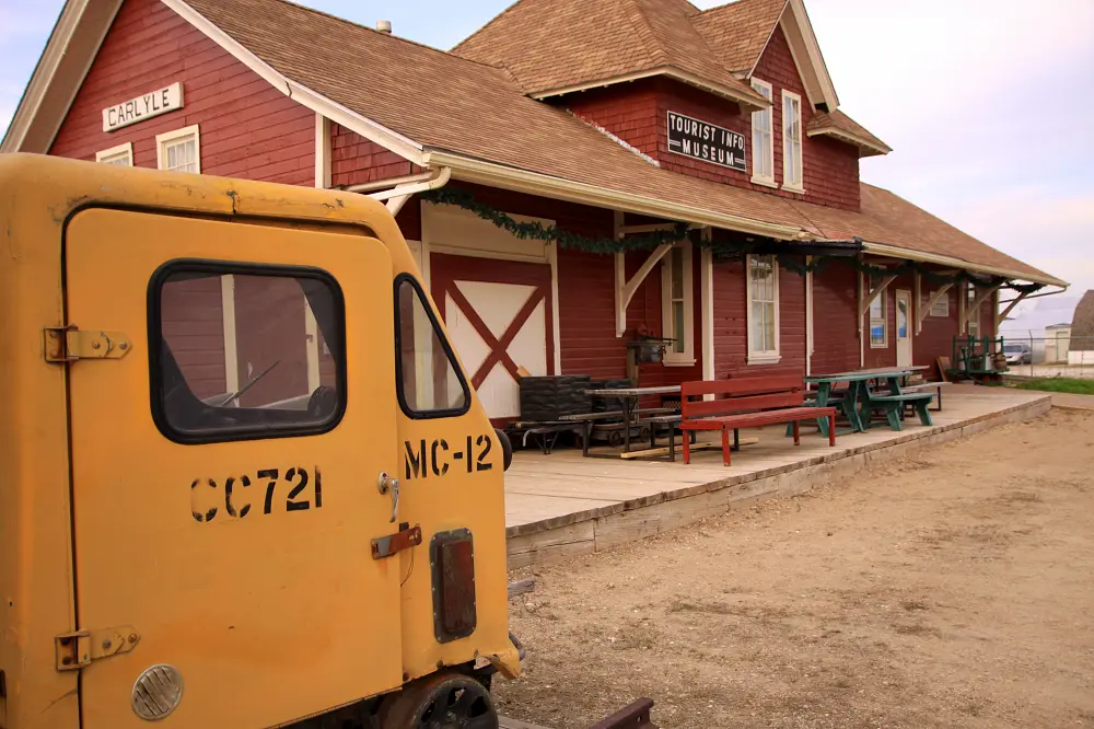 Carlyle train station museum with railway motor car