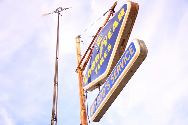 Goodyear Tires and McLeod's Service signs